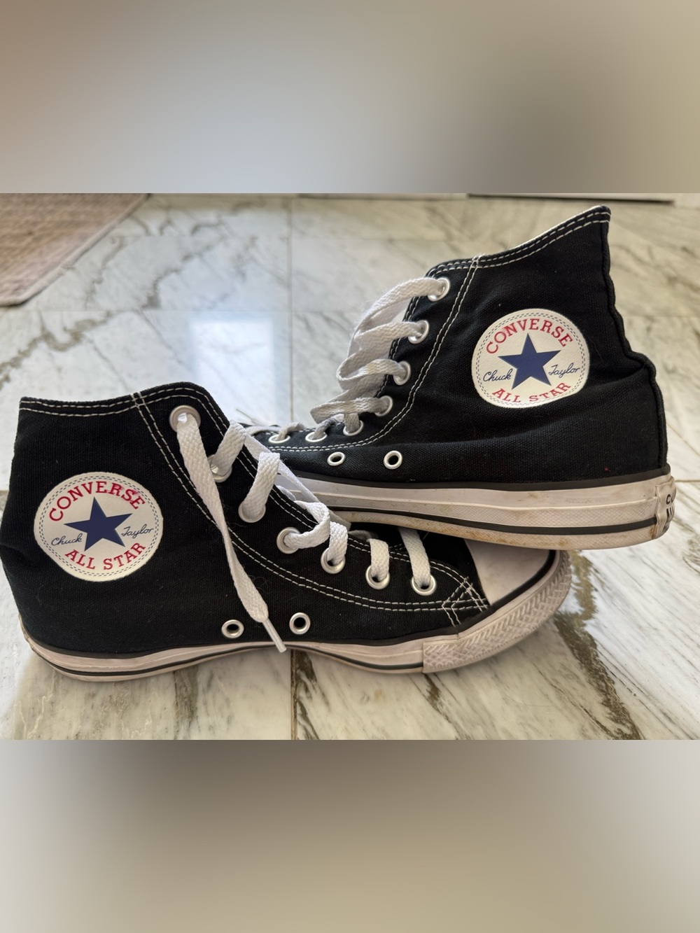 Converse Ladies 9 Men’s  7  Black and White Chuck Taylor High-Top Sneakers